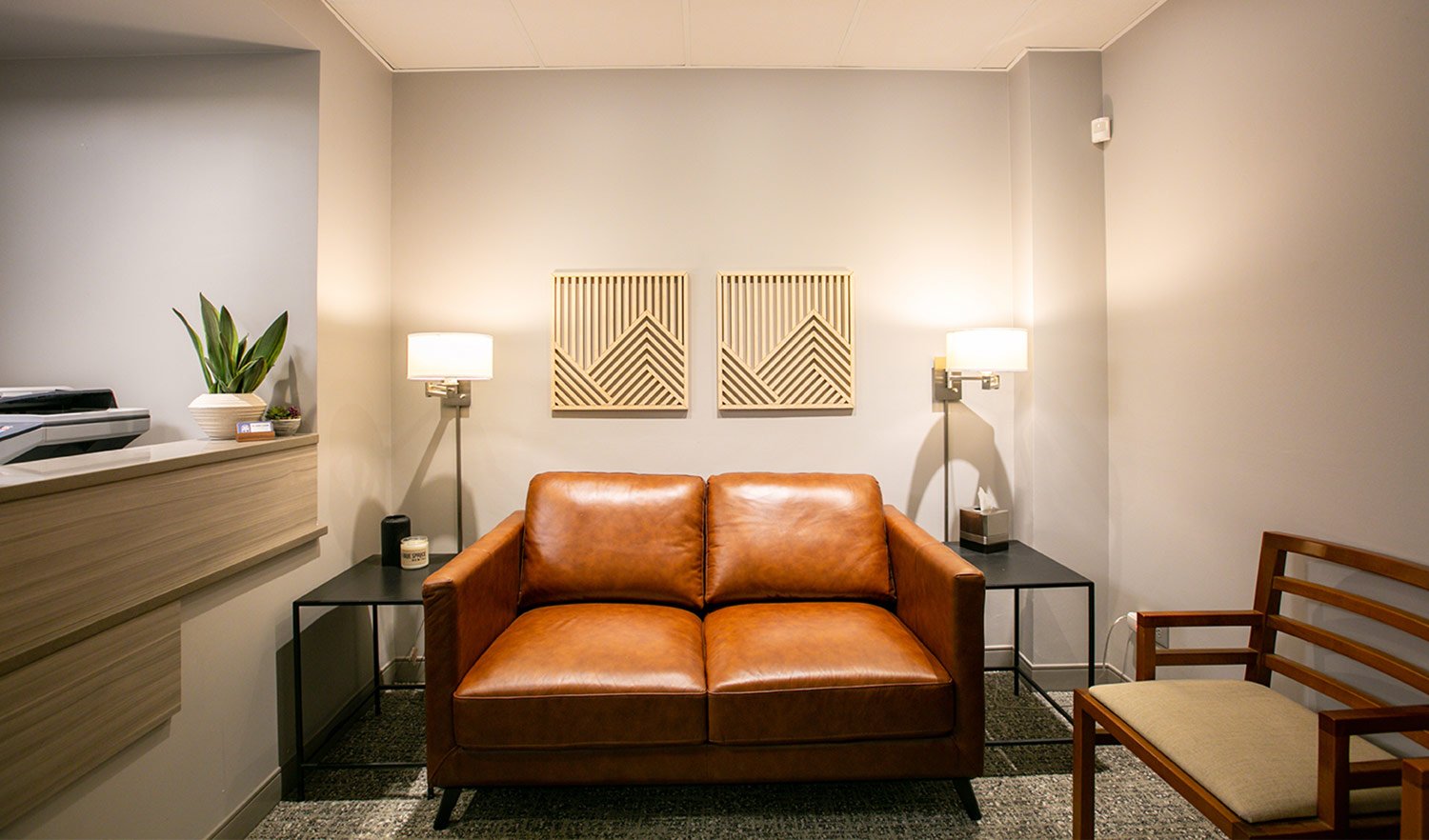 Dentist waiting area with leather couches | Blue Spruce Dental | Denver Dentist serving Glendale &amp; Cherry Creek
