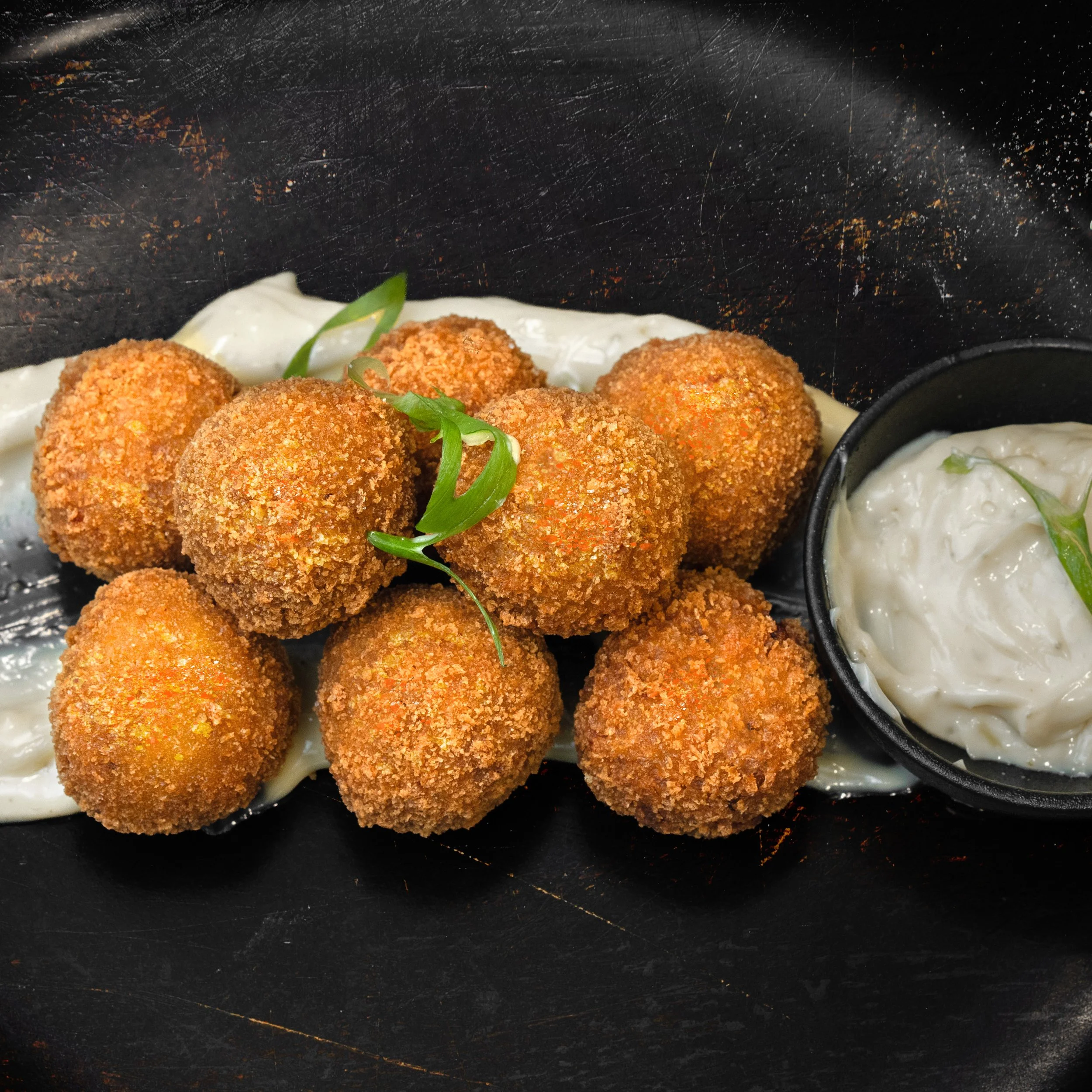  
 BOLOGNESE ARANCINI BALLS 
 
8 bolognese arancini balls served with basil aioli.