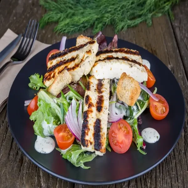  
 HALLOUMI RANCH SALAD 
 
Halloumi cheese, mixed salad, cherry tomatoEs, Spanish onion, croutons & ranch dressing.