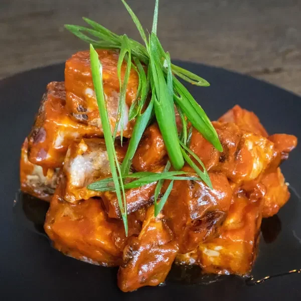  
 PORK BELLY BITES 
 
Pork belly bites coated in your choice of creamy BBQ sauce, buffalo hot suace or cherry cola BBQ sauce.