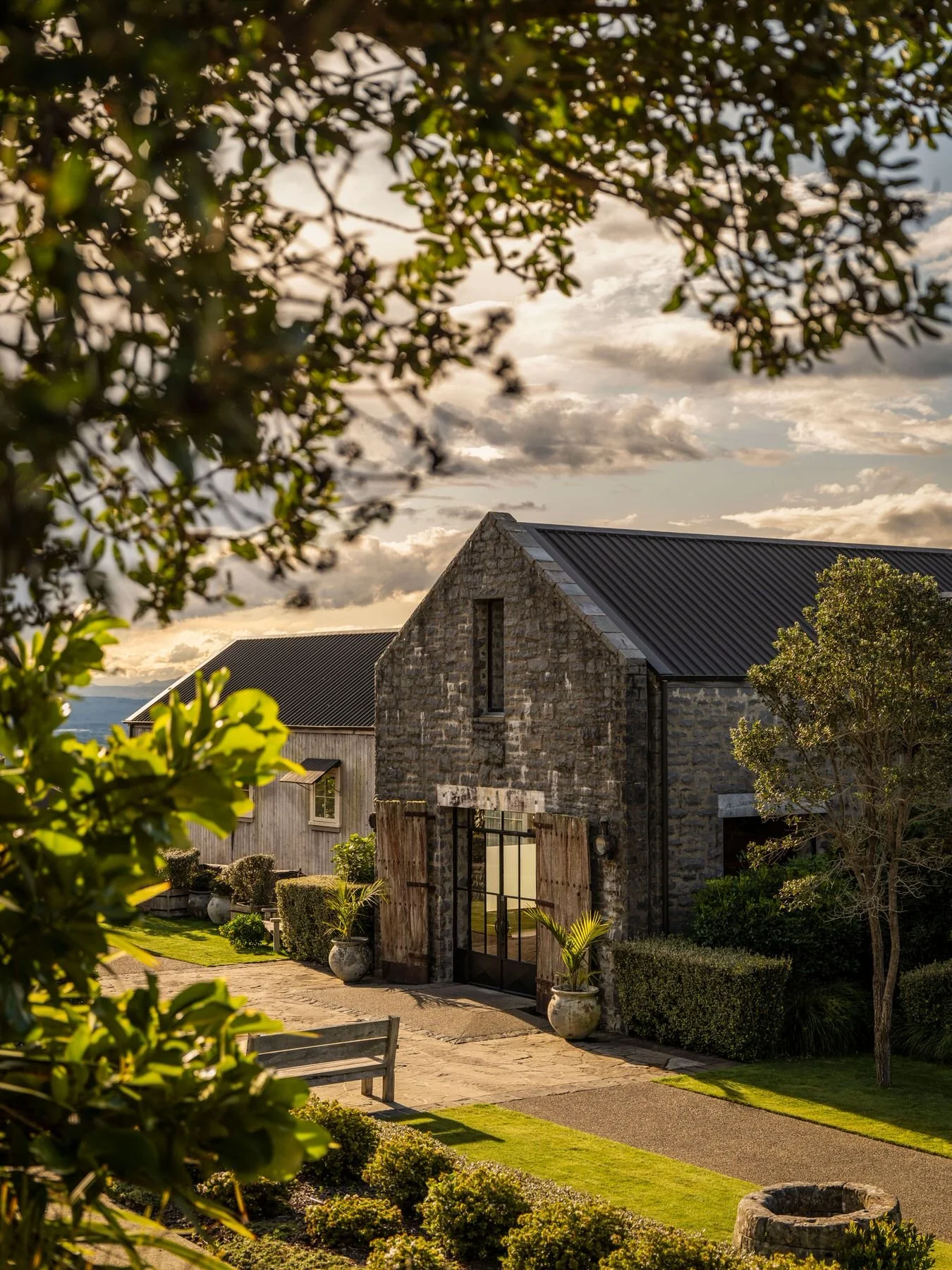 Exterior of The Farm at Cape Kidnappers luxury lodge in Hawke’s Bay, New Zealand