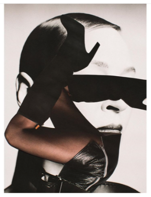 Dark abstract artwork with overlapping shapes and warm brown detail.