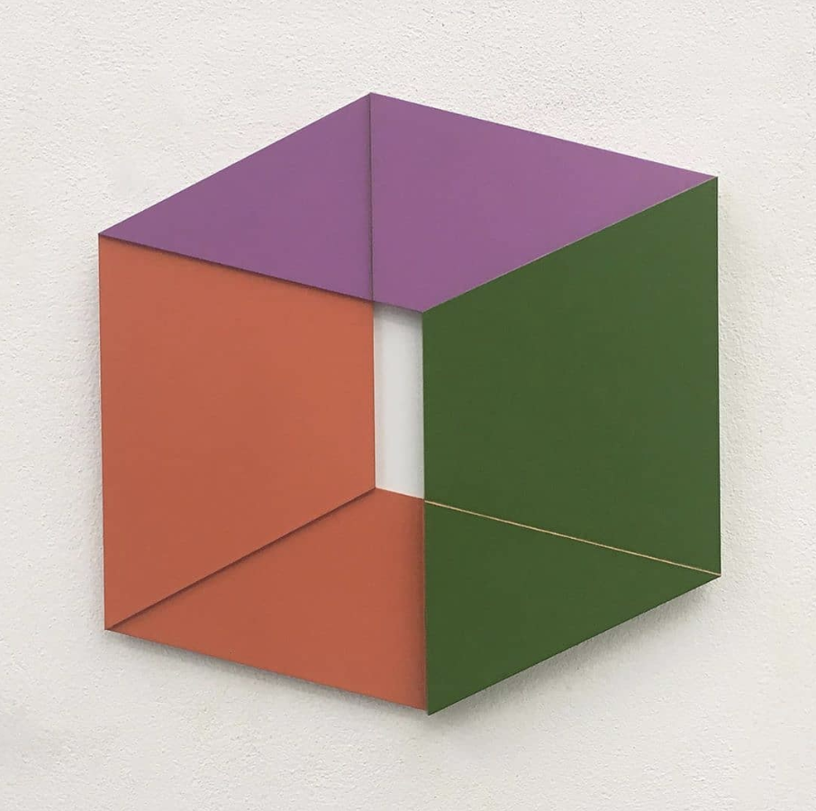 Geometric hexagonal colour composition in purple, green and coral.