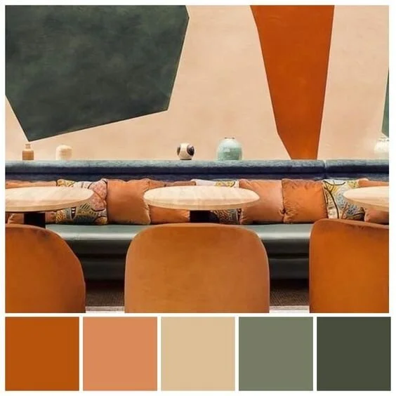 Warm orange seating and geometric wall colours with coordinated palette swatches.