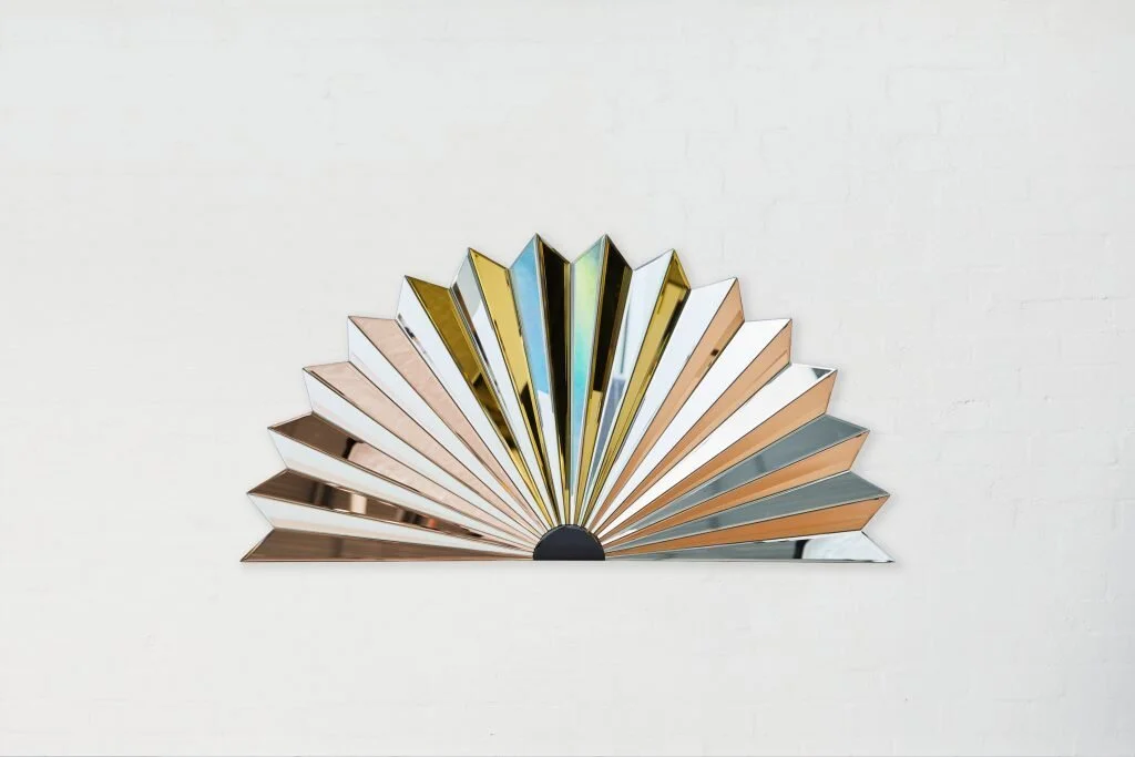Fan-shaped arrangement of coloured surface samples.