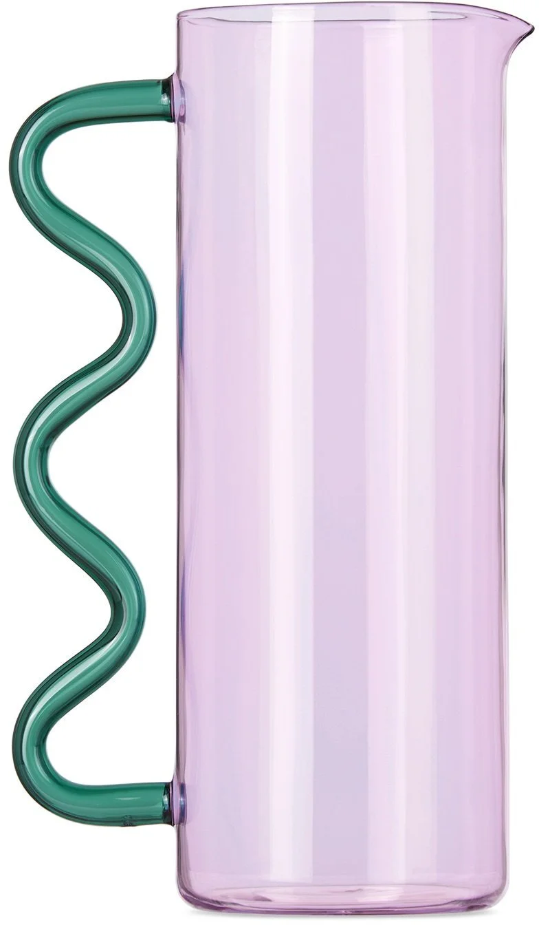 Lilac glass Wave Pitcher by Sophie Lou Jacobsen with a green undulating handle.