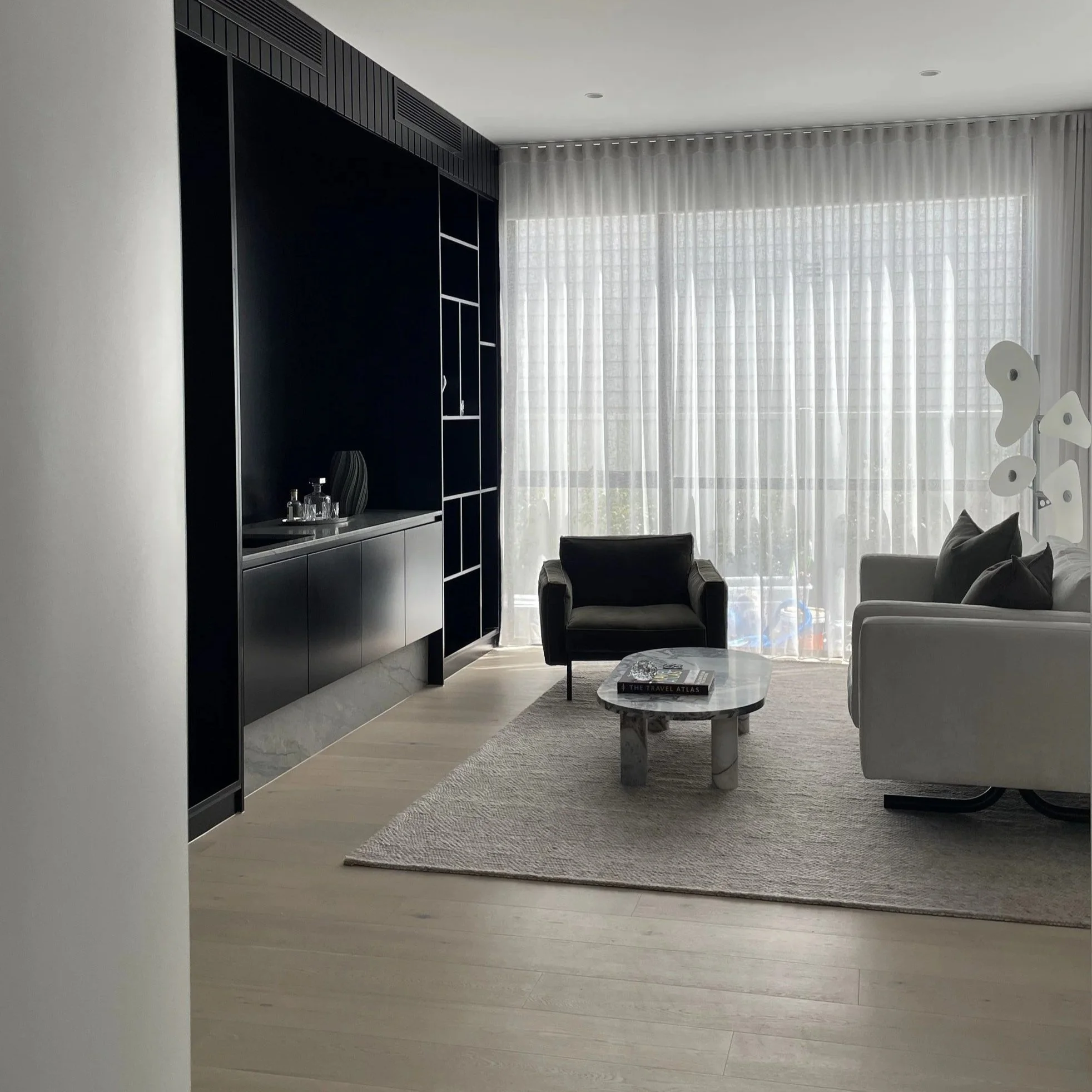 melbourne-interior-design-living-room-dark-joinery-sheer-curtains-concept-dcf.jpg
