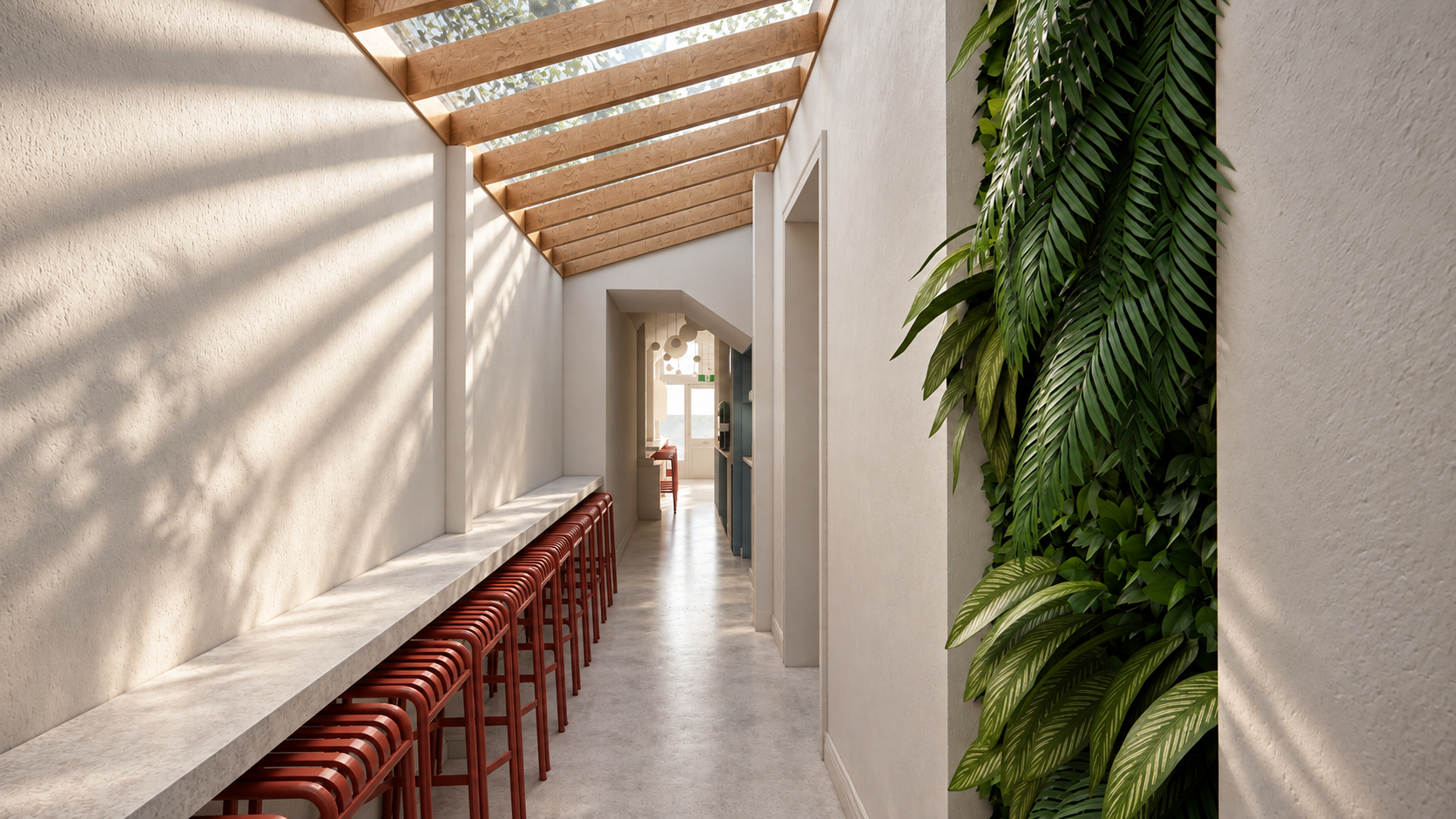 a living green wall and skylight bring natural texture and light into the narrow dining walkway, balanced by clean finishes and repeated red seating.