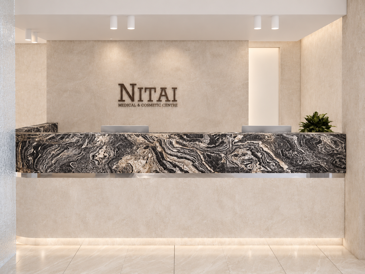 a dramatic stone reception desk anchors the entry, creating a strong first impression against the soft neutral finishes surrounding it.