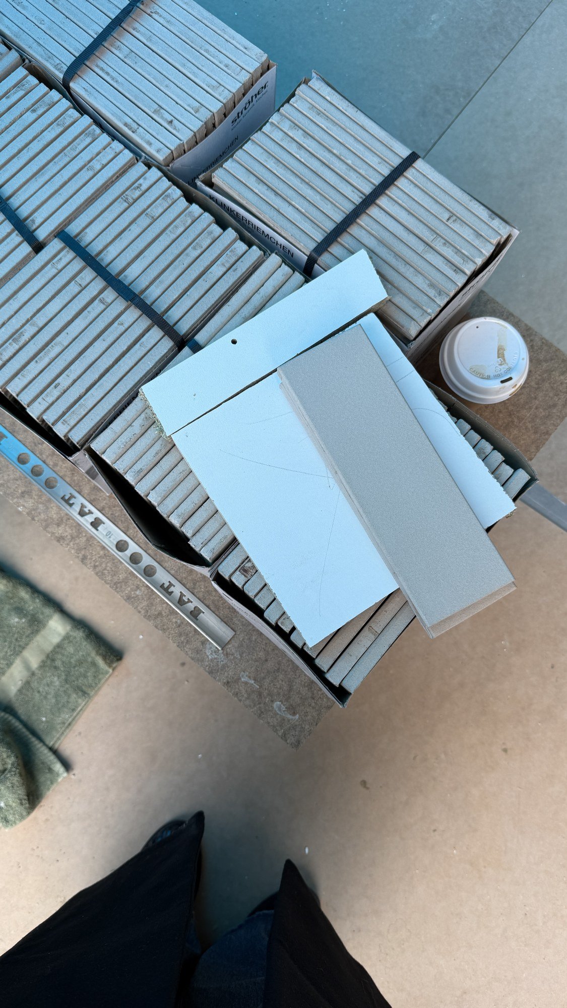 Blue finishes paired with natural stone, timber and textiles.