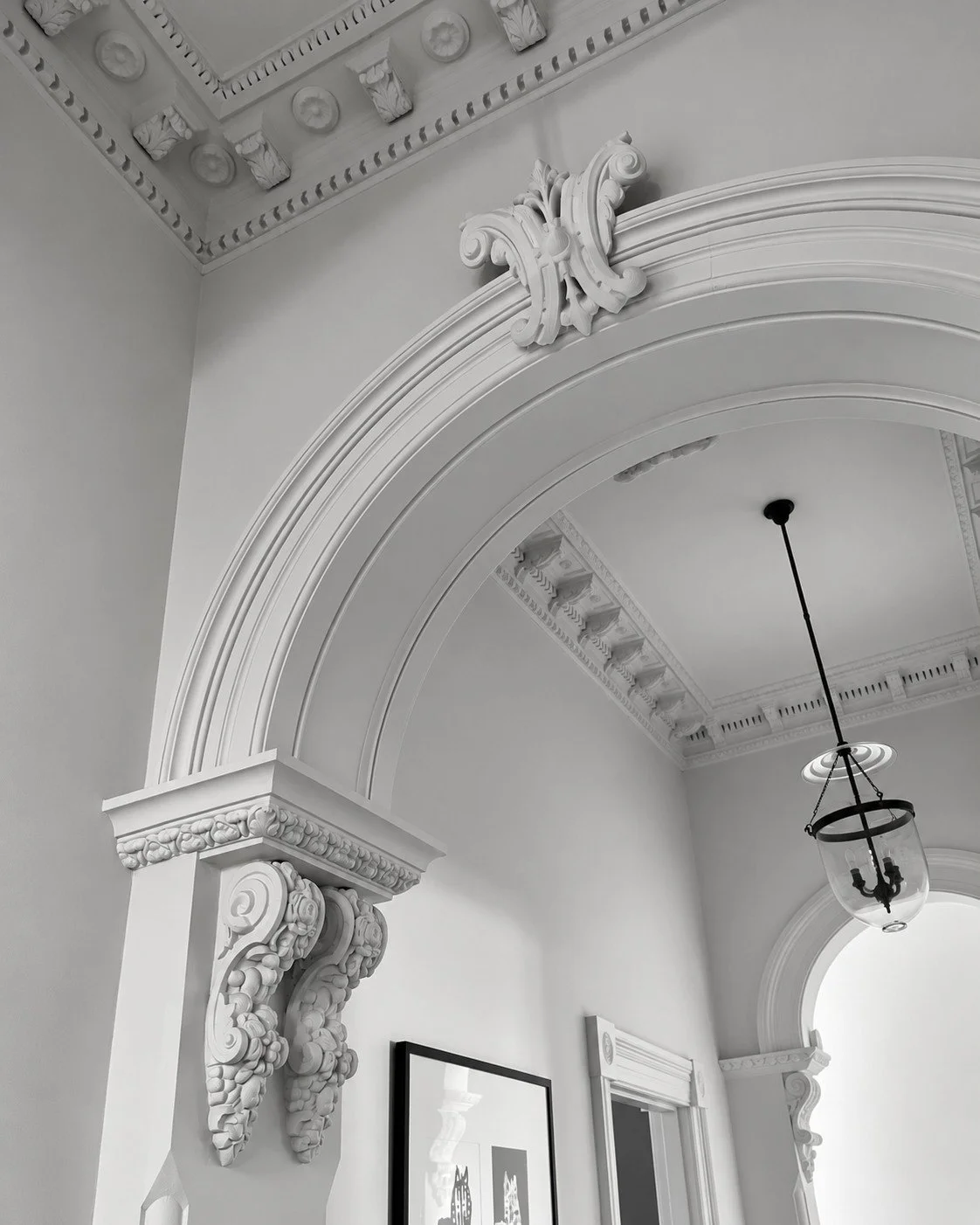 Craigneal heritage archway with ornate plaster mouldings and a decorative ceiling.