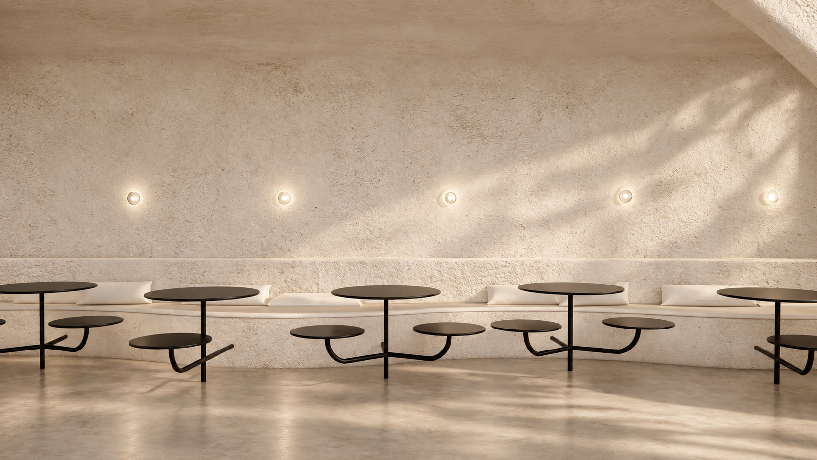 repetition, texture and subtle lighting bring rhythm and warmth to the seating area.