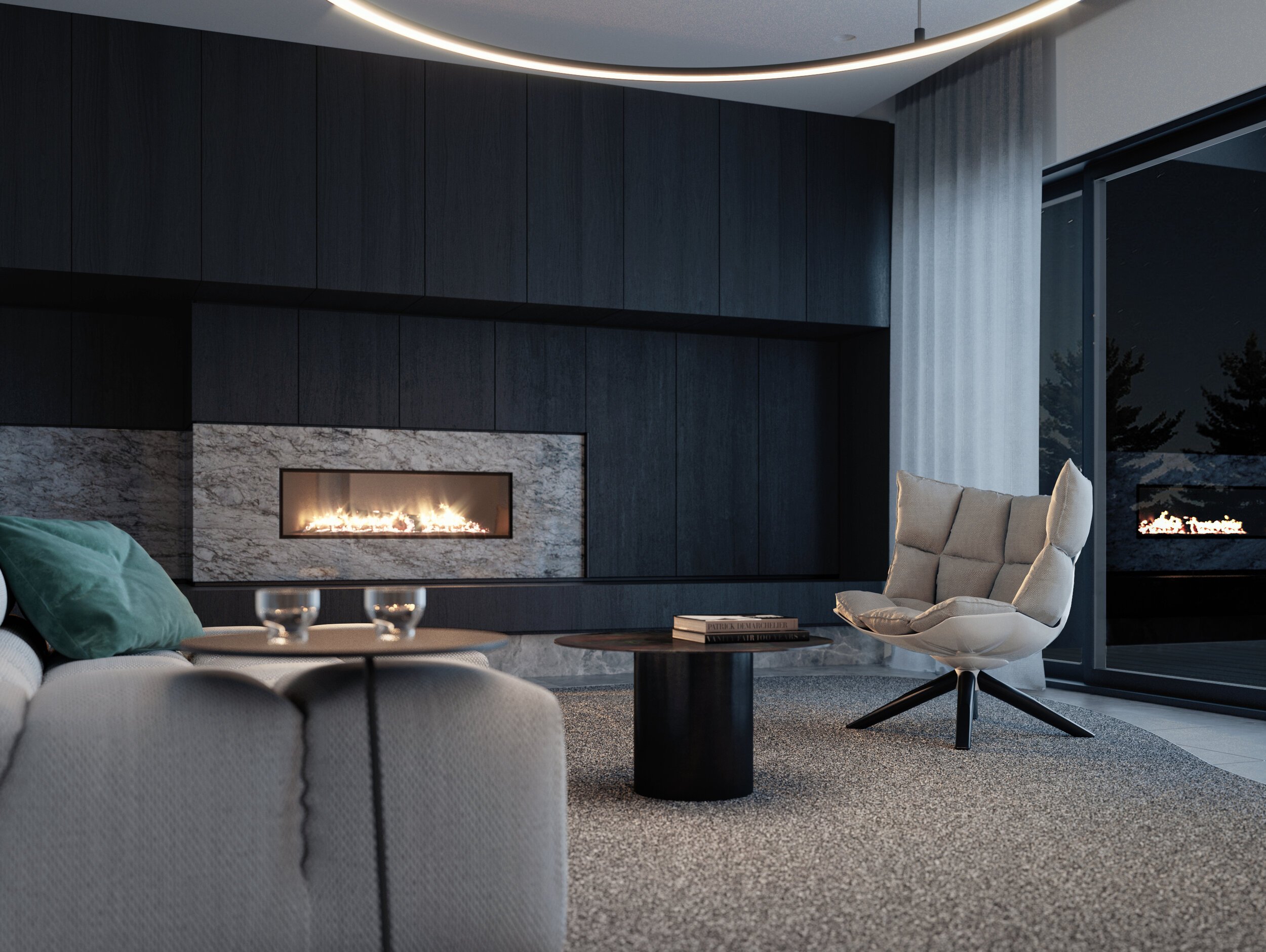 Modern living room with black wood and marble fireplace, beige lounge chair, light-colored curtains, and large window showing outside trees, with a textured gray carpet.