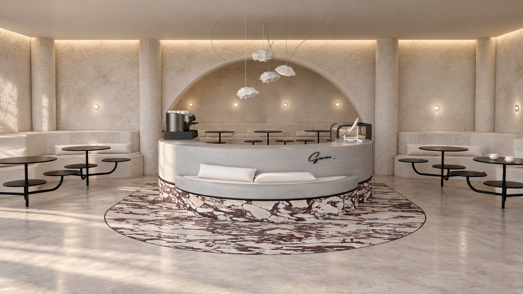 a sculptural curved counter finished with bold burgundy-veined stone creates the focal point of the café.