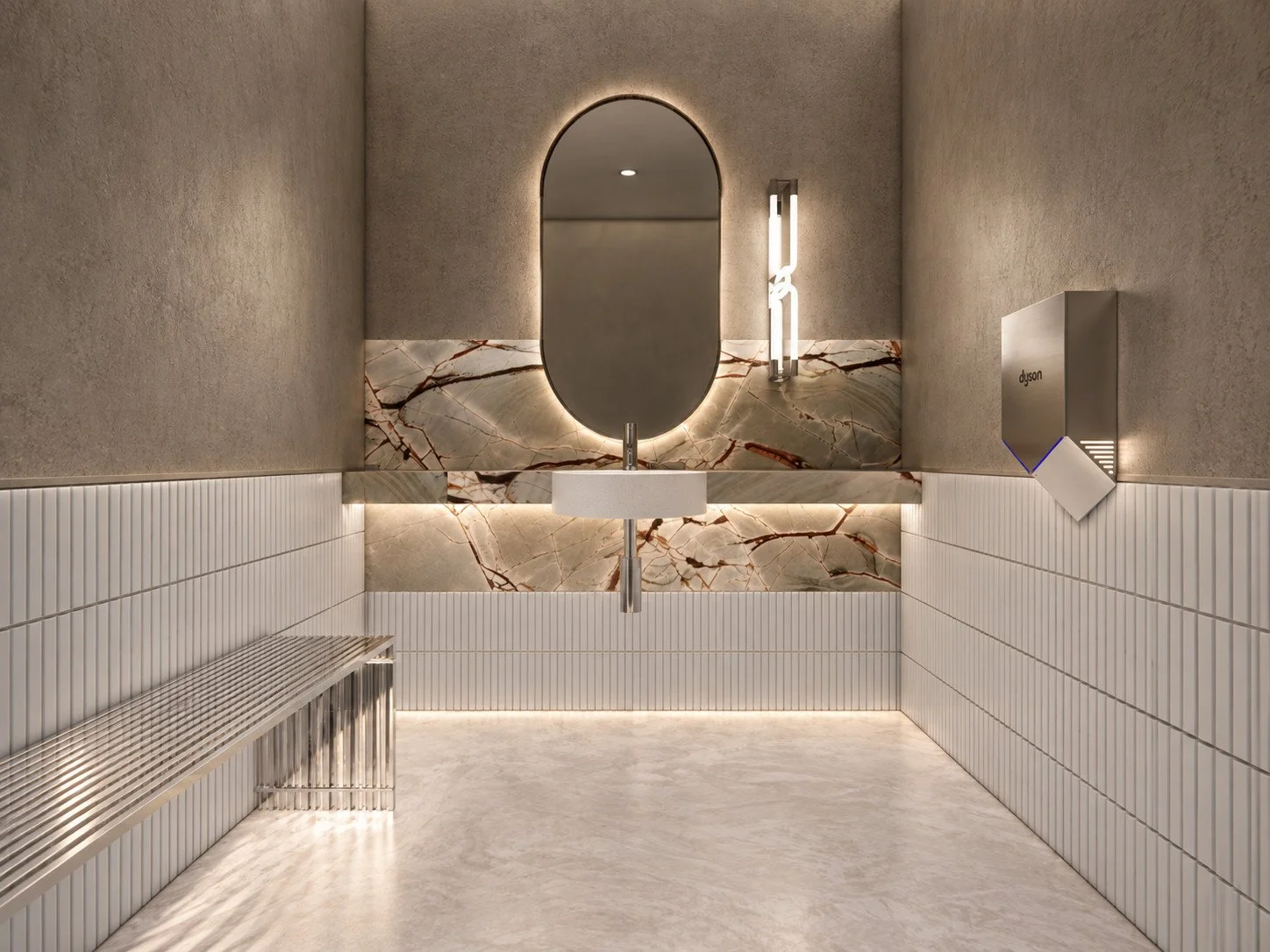 veined stone, vertical white tiles and an illuminated oval mirror carry the material palette into the bathroom.