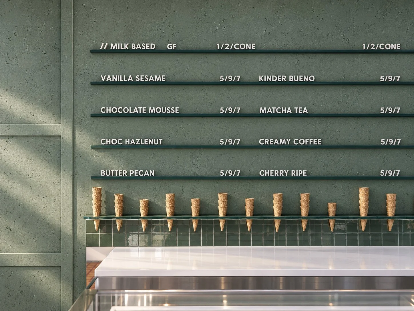 custom menu lettering and a glass-mounted cone display bring graphic detail to the green panelled wall behind the counter.