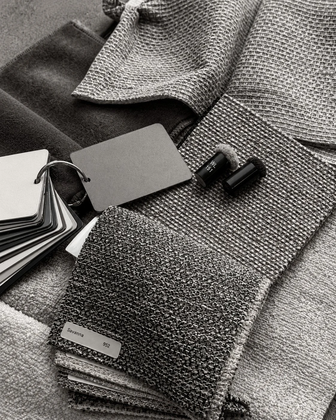 Textile, stone and finish samples considered together for Lorde House.