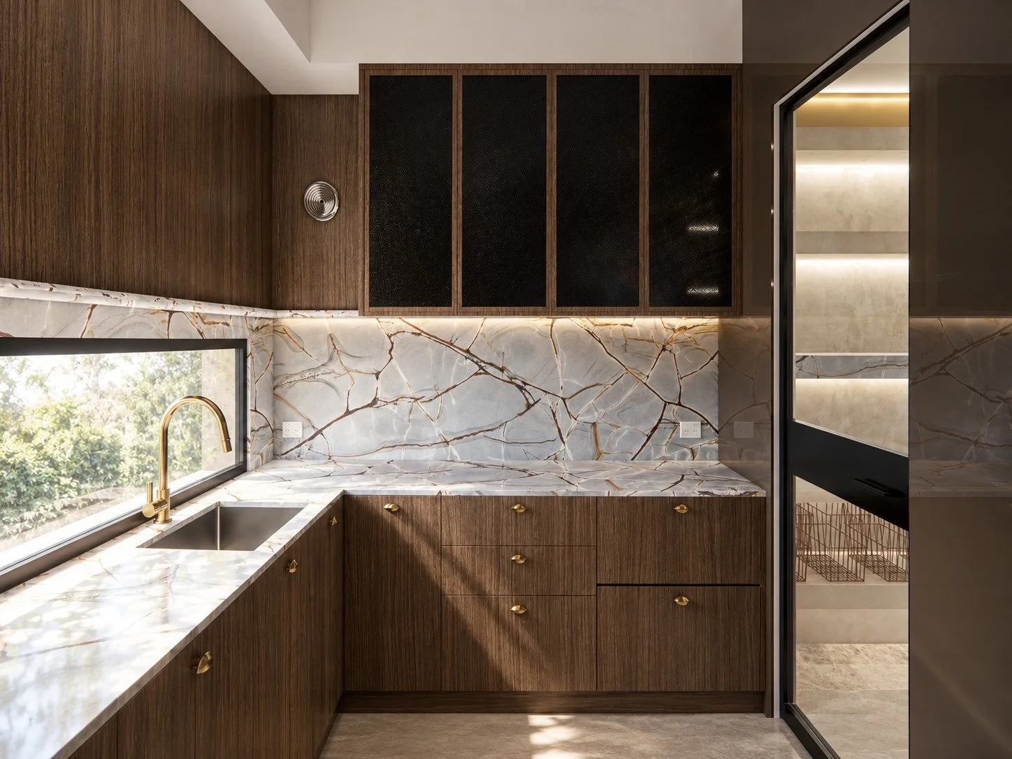 Alpine House pantry corner with timber cabinetry, dark glazed cupboards and veined stone surfaces.