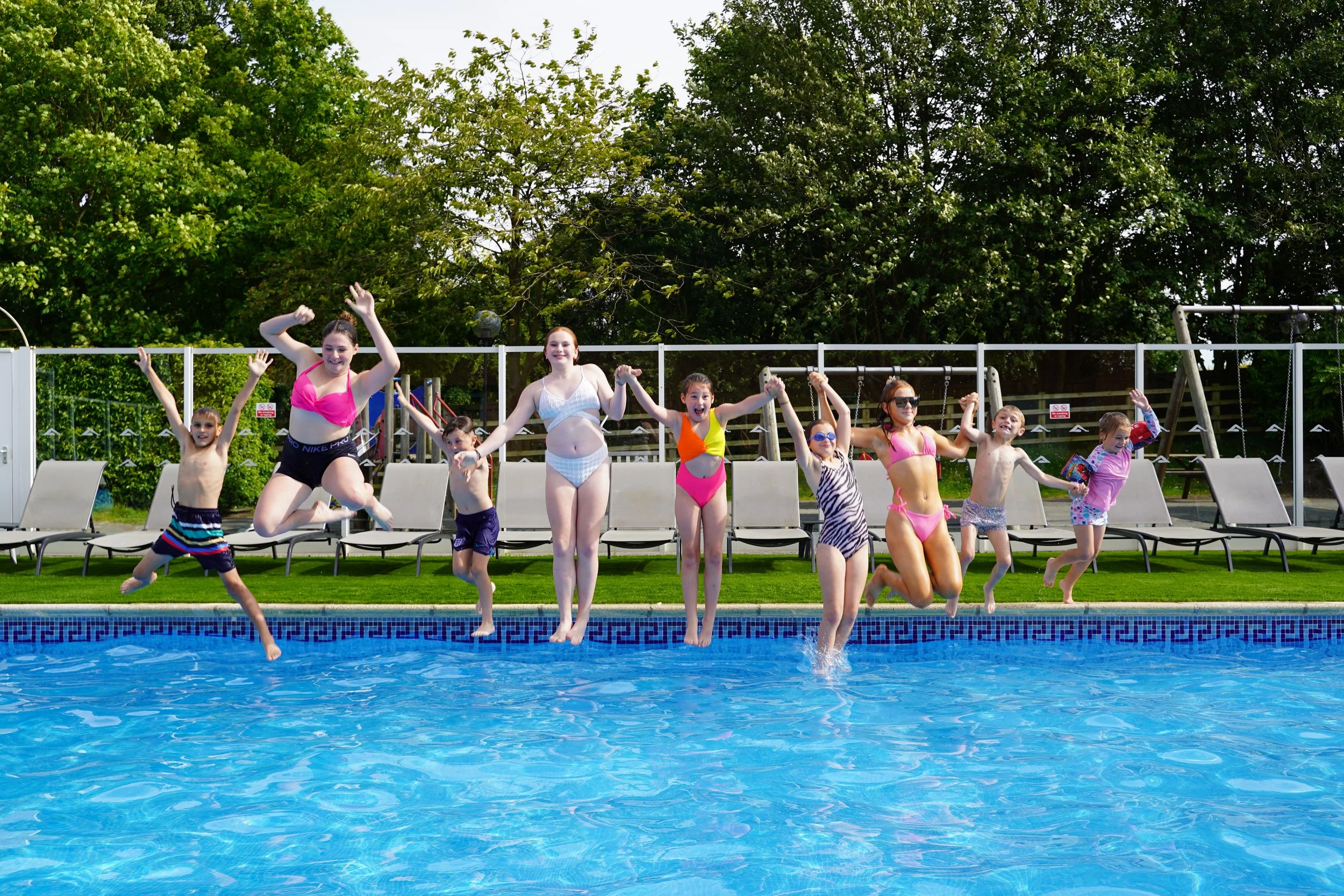 Kids jumping in pool.JPG