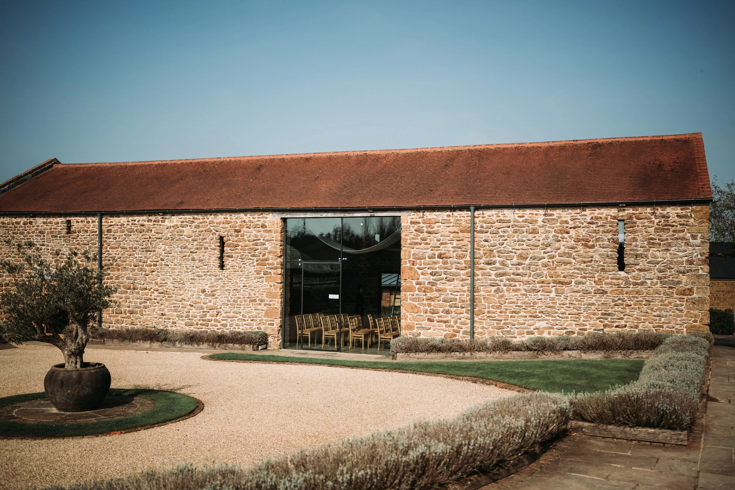 Dodford manor wedding outside view of the ceremony barn