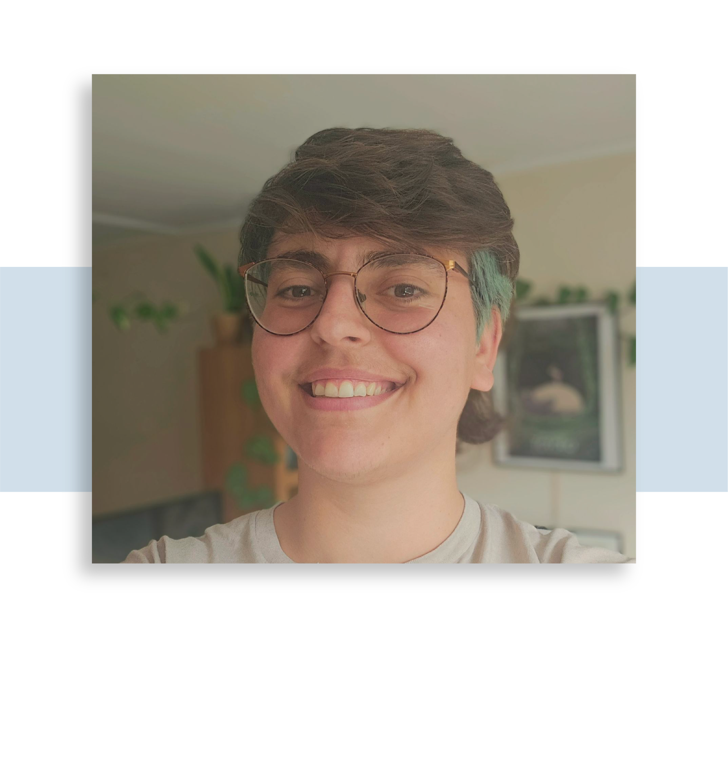 Image of Miranta Kouvari, MPhil, MSc. Smiling person with glasses and short brown hair, taking a selfie.