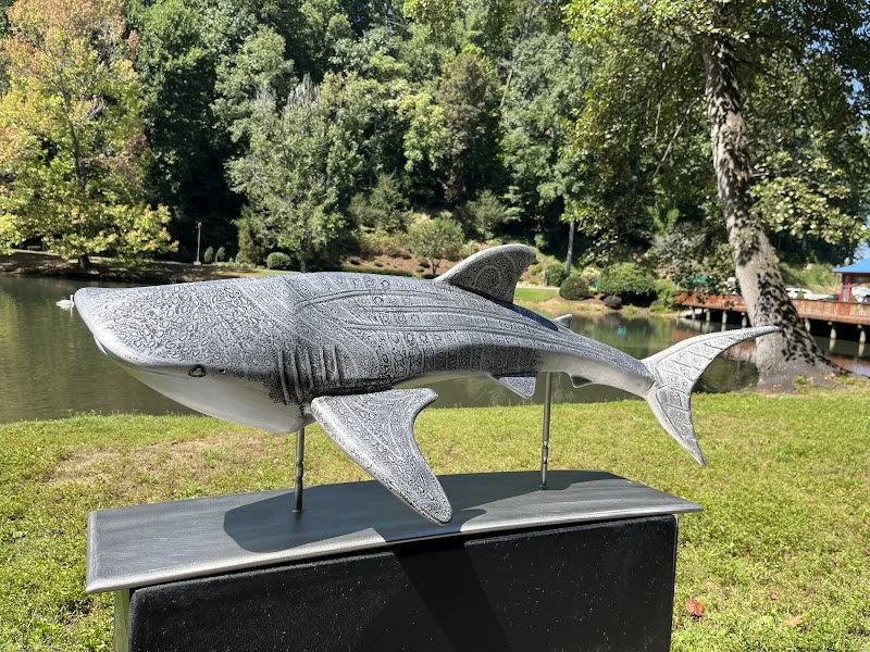 Scott Strader, Aluminum and stainless. All of my work is fabricated to look as though it was cast.