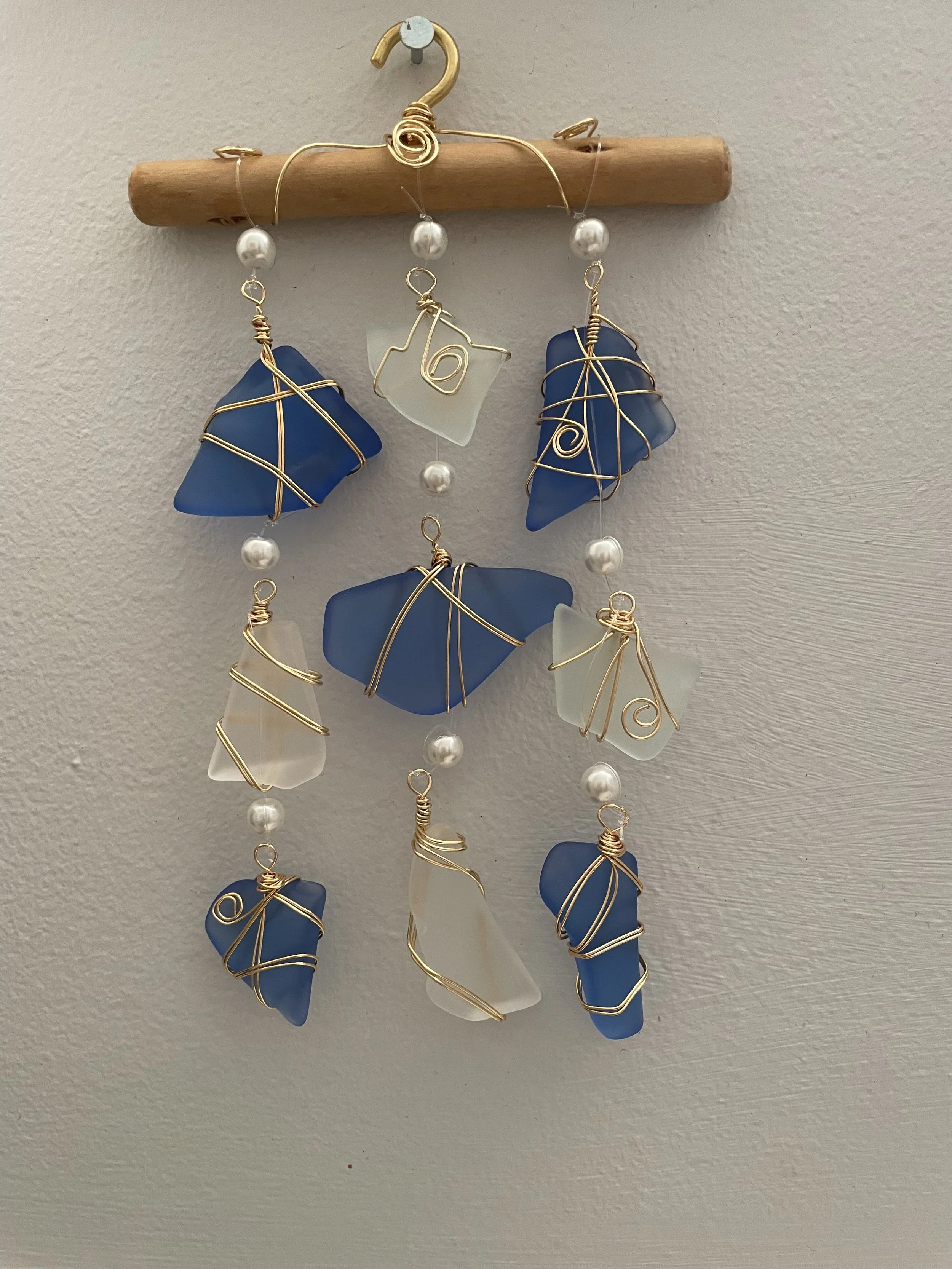 Susan Gianiotis-Nappo - I make cultured glass necklaces and sun catchers 