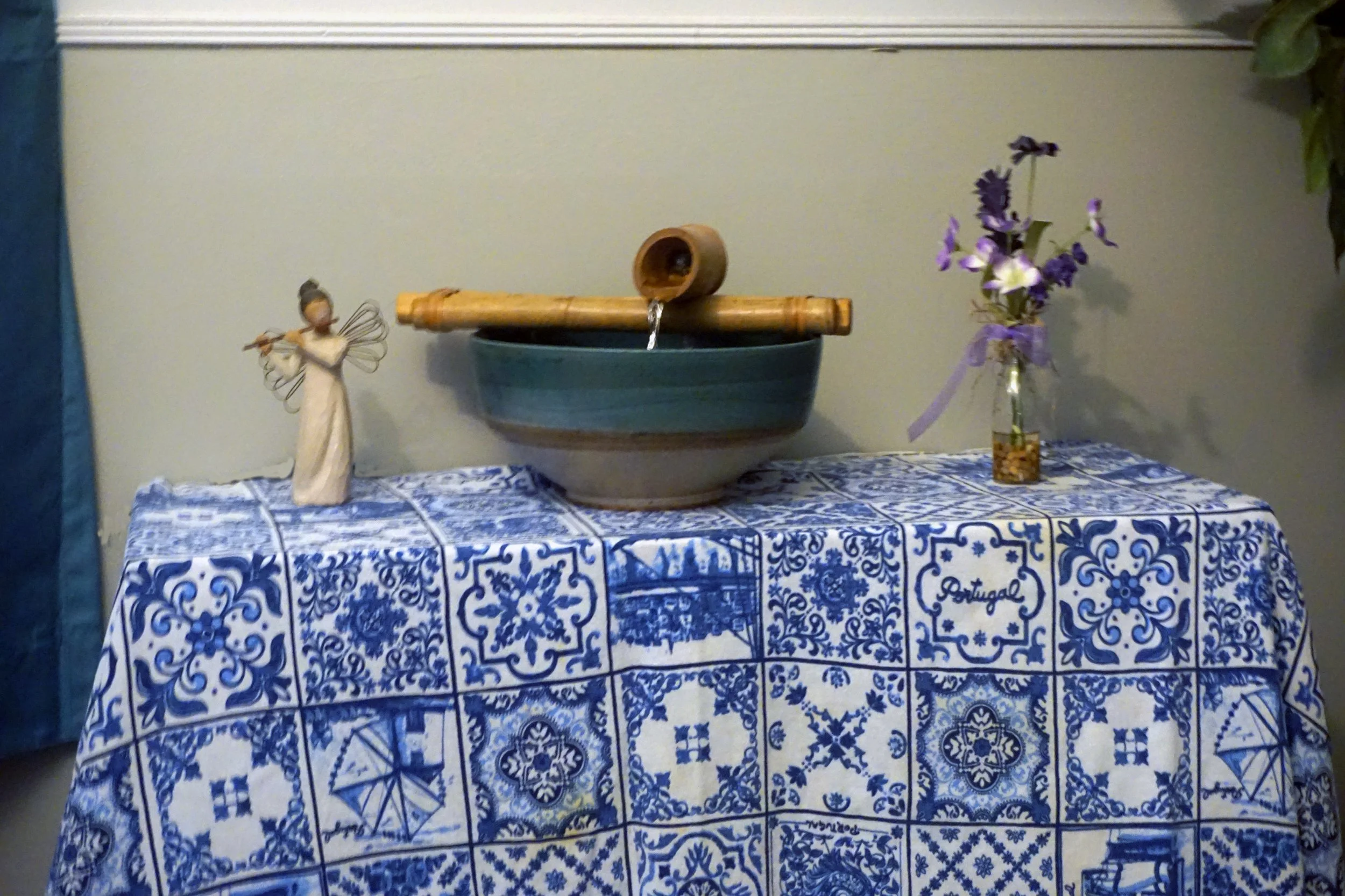 Healing images such as the flowers, water fountain, and angel flute player here are helpful EMDR coping skills.