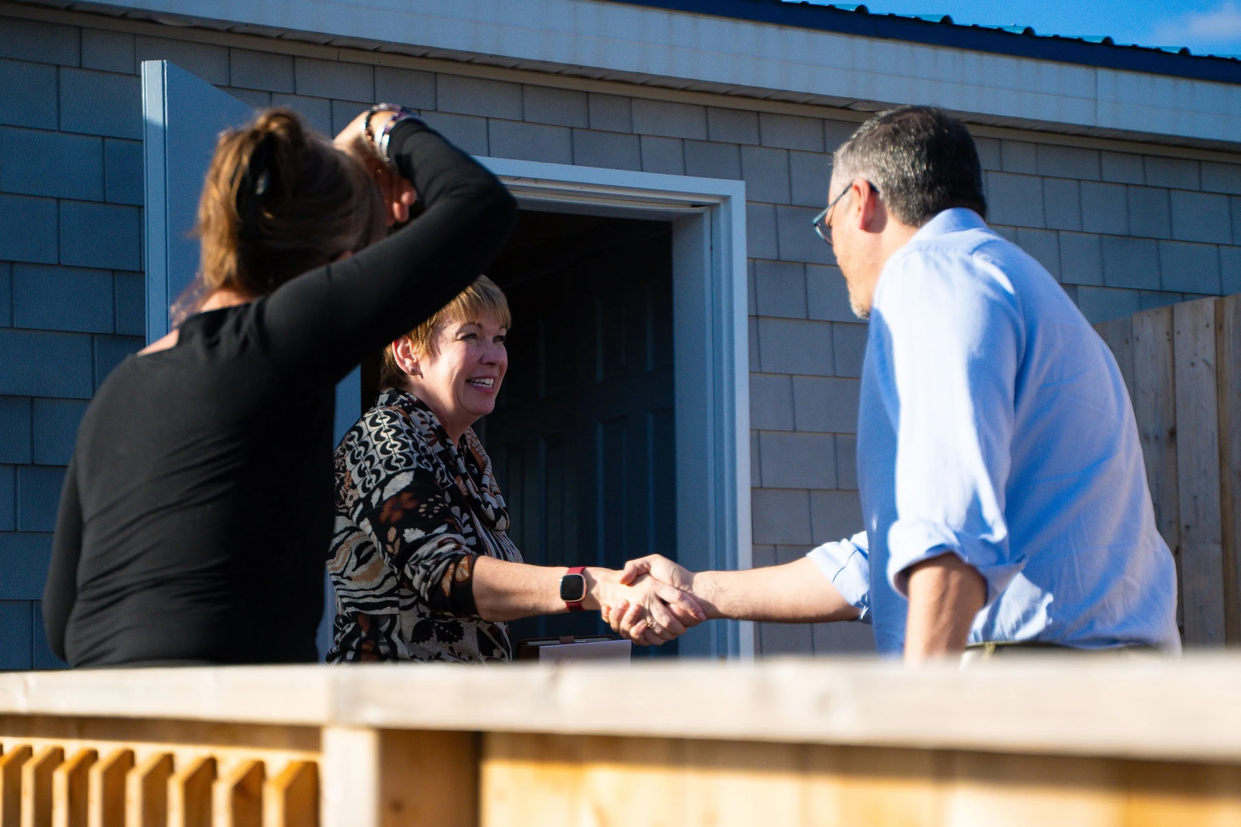 Ravens Rest Retreat Event - woman and man shaking hand.jpg