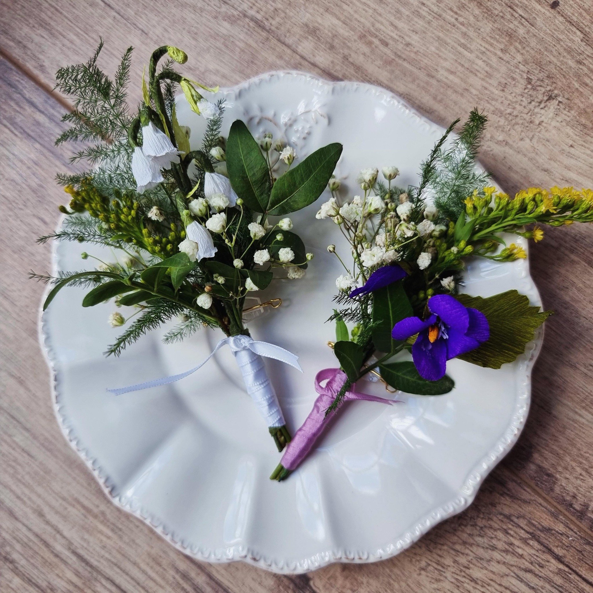 The grooms wanted to represent each other&rsquo;s birth month with the corresponding flower-Violet for February and Lily of the Valley for May. Not finding the flowers I needed, I created them in paper and mixed a few real flowers in. This also gives