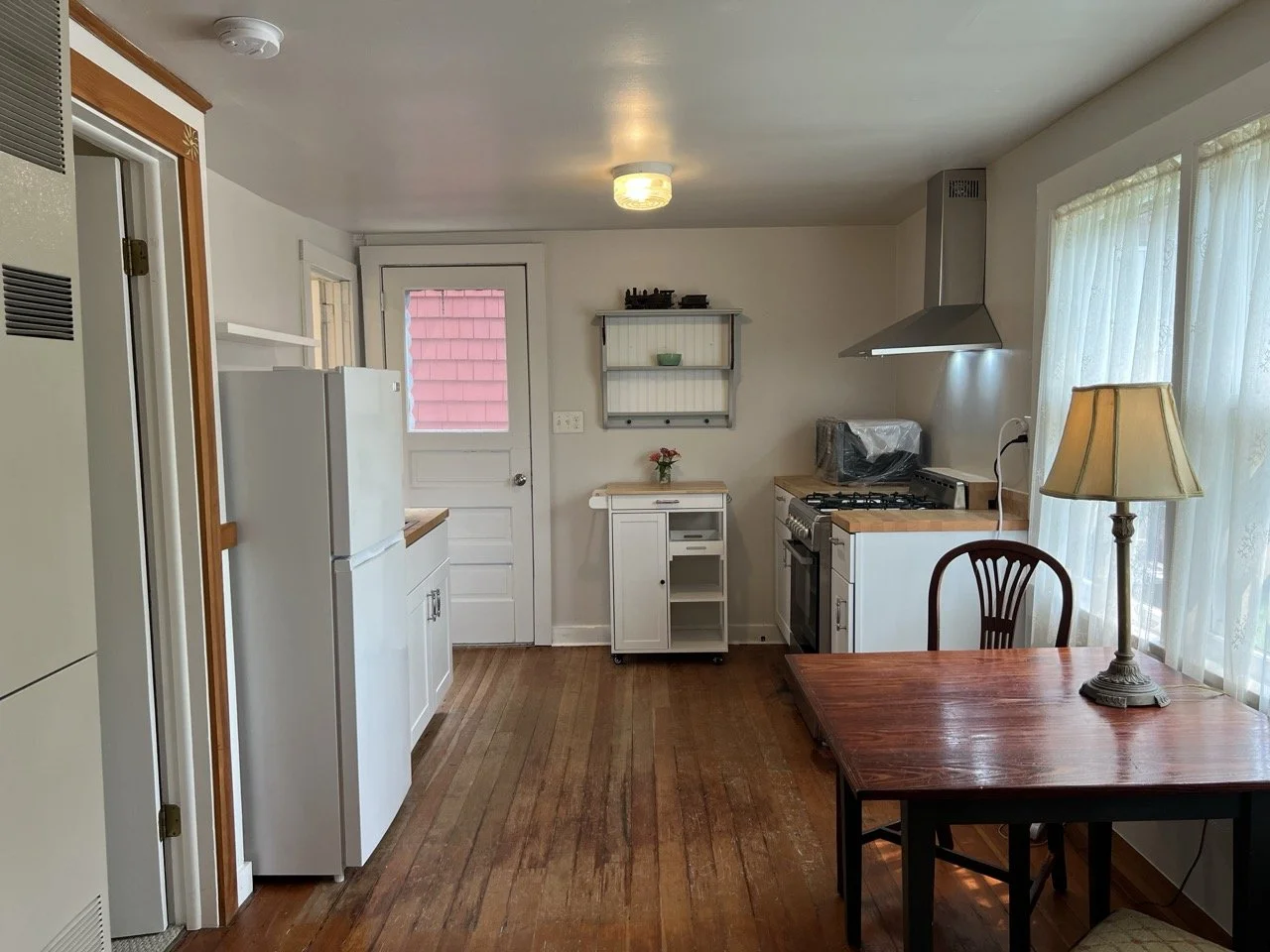 7 Pohndorf dining area to kitchen.jpeg