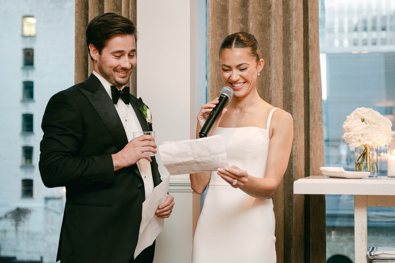 Family and friends gathered during a destination wedding farewell speech.