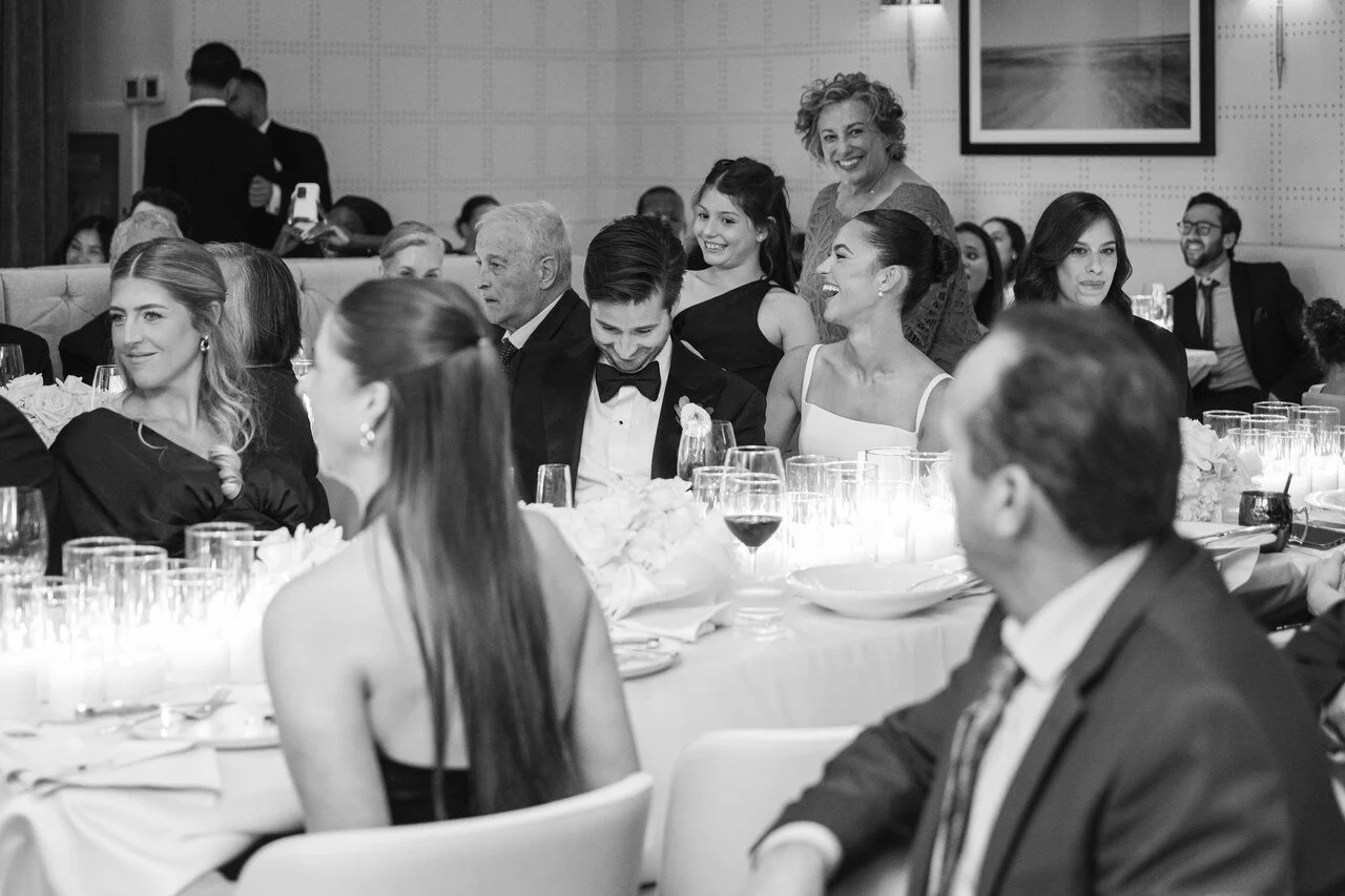 Guests mingling during a destination wedding welcome party designed by Claudia and Co.