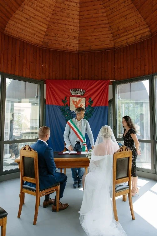Couple exchanging vows, civil wedding ceremony Italy