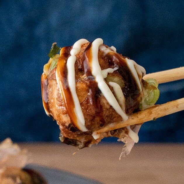 Takoyaki (Japanese octopus balls) were one of the most fun bites I had while visiting Japan. Think of a round savory pancake that&rsquo;s crispy on the outside and topped with creamy, tangy sauces and lots of umami flavors and crunch. Simply put, the