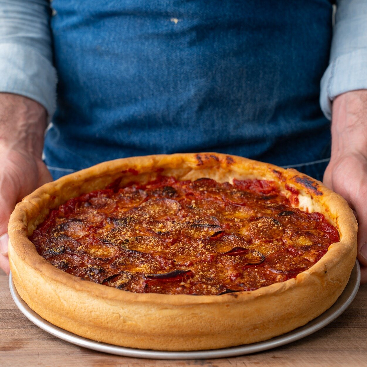 Coming into this world at 12&quot;, 6lbs 8oz, I'd like to introduce my new and improved recipe for Chicago Deep Dish Pizza! 🍕🎉 I've been working to perfect this recipe for a while and I'm excited to finally share it. Watch my latest YouTube video t