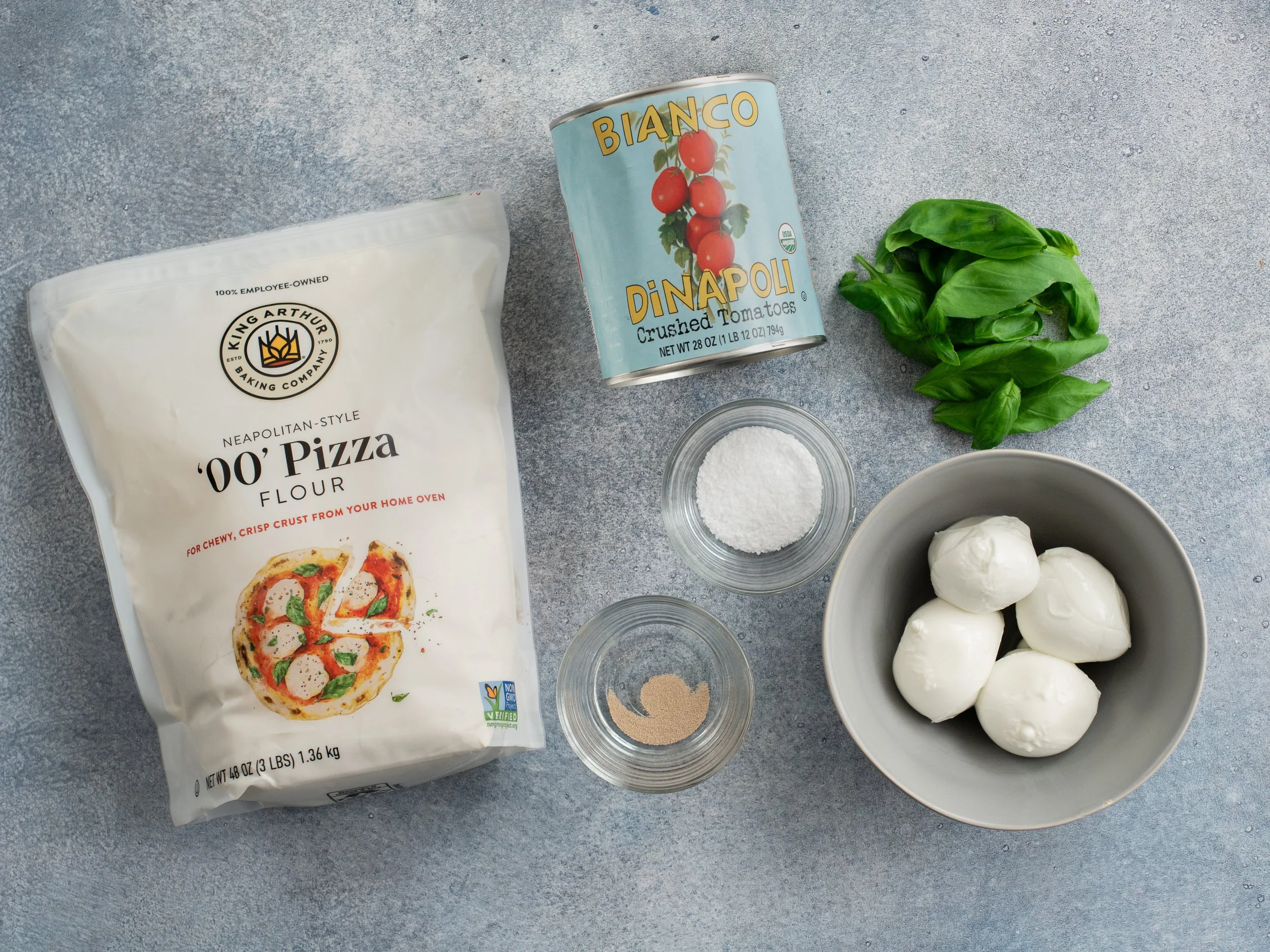 ingredients for Neapolitan pizza on grey background