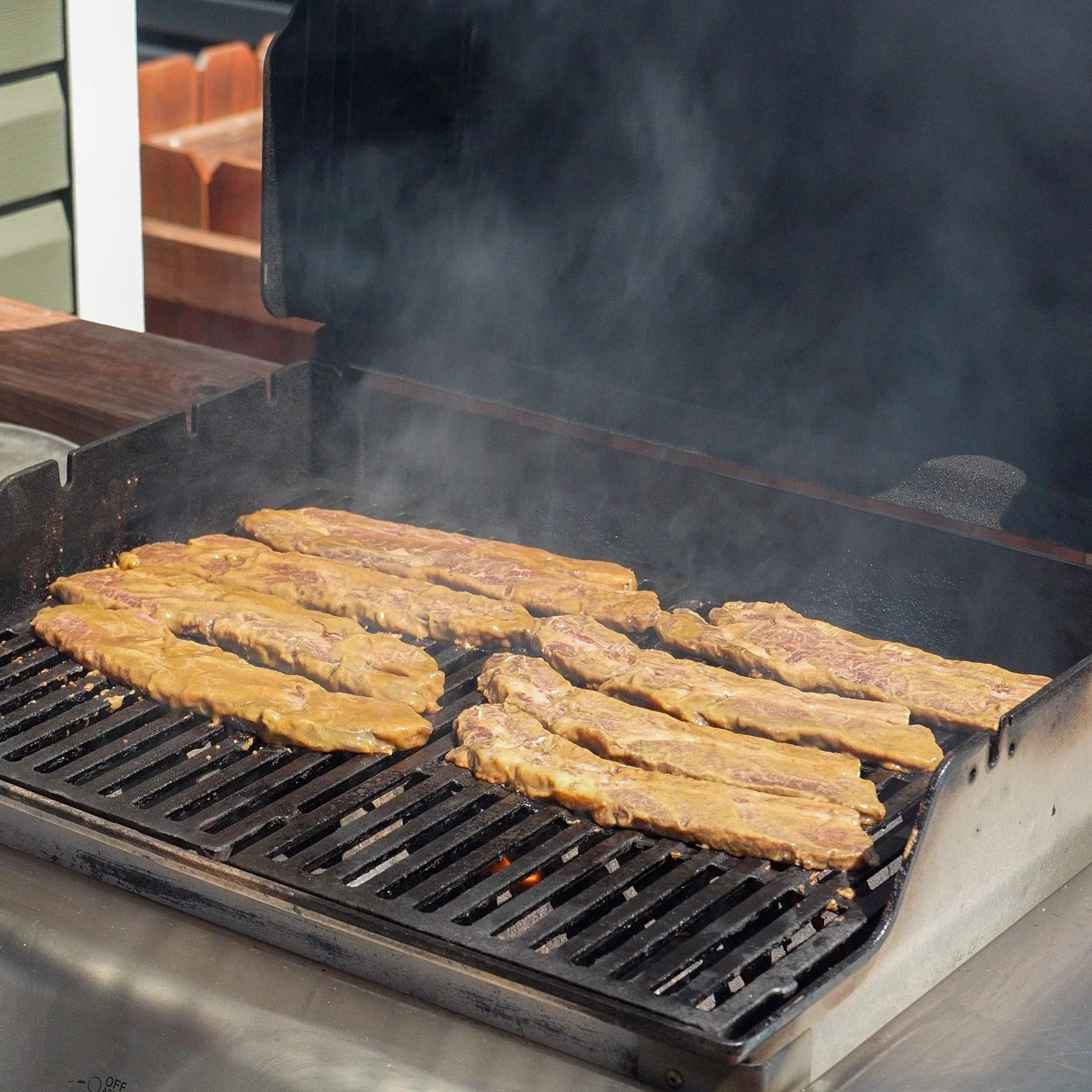 marinated korean galbi short ribs on a grill