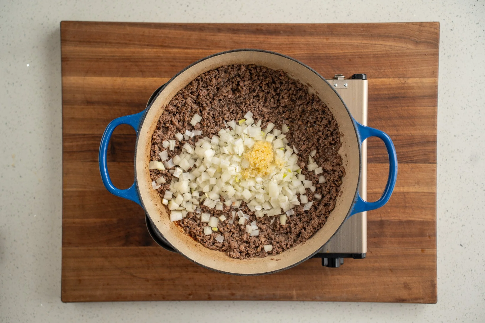 sautée onions and garlic