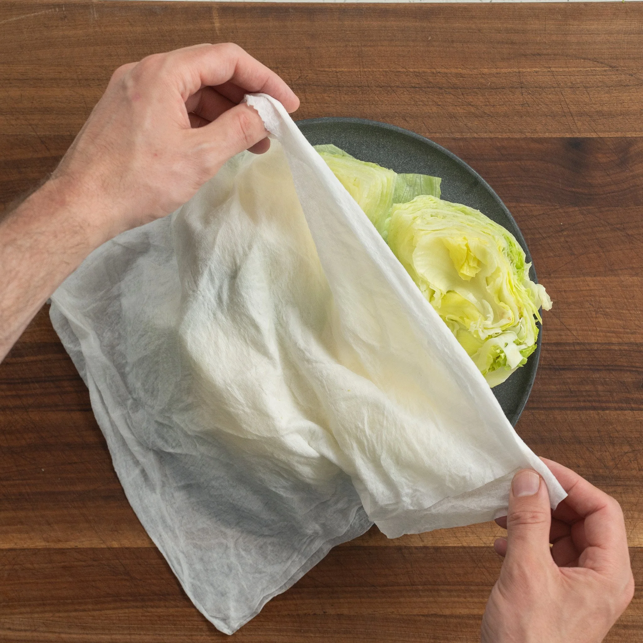 covering iceberg lettuce wedges with paper towel