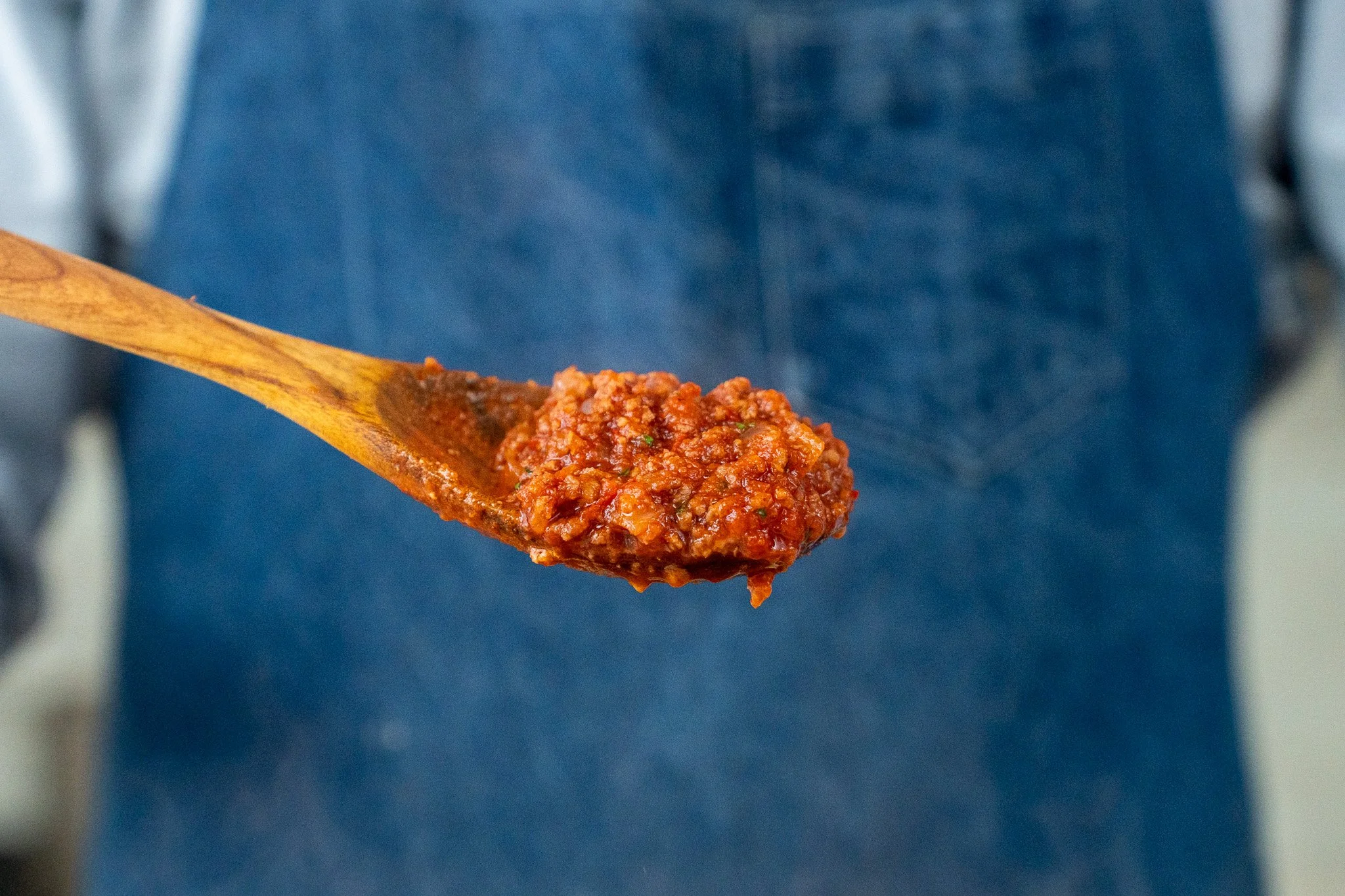 spoonful of tomatoey meat sauce