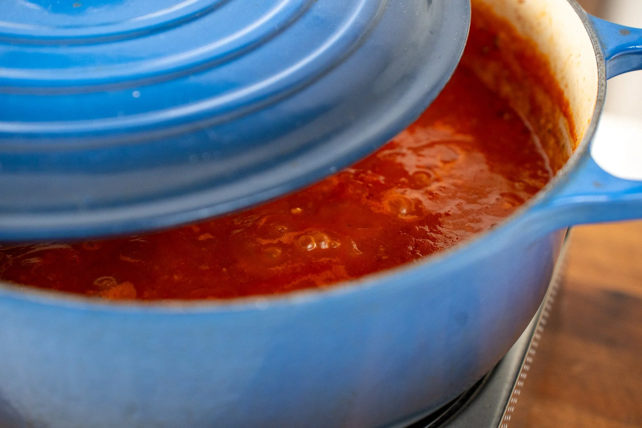 covered tomato sauce simmering