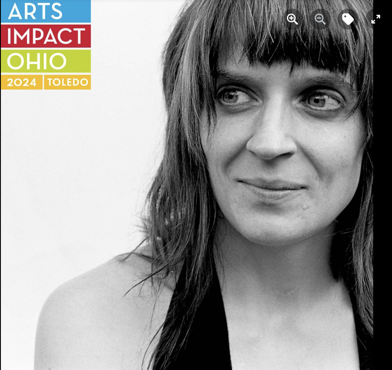 Black and white portrait of a woman (Dr. Tasha Golden) with shoulder-length hair and bangs, looking to her right. In the top left corner, colorful text reads "ARTS IMPACT OHIO 2024 TOLEDO."
