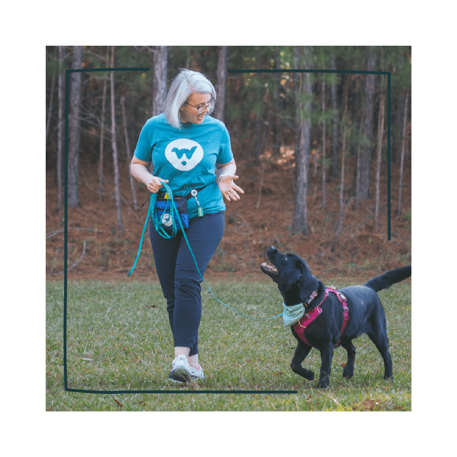 Eryn Rolison clicker trains her dog to walk nicely on a leash.