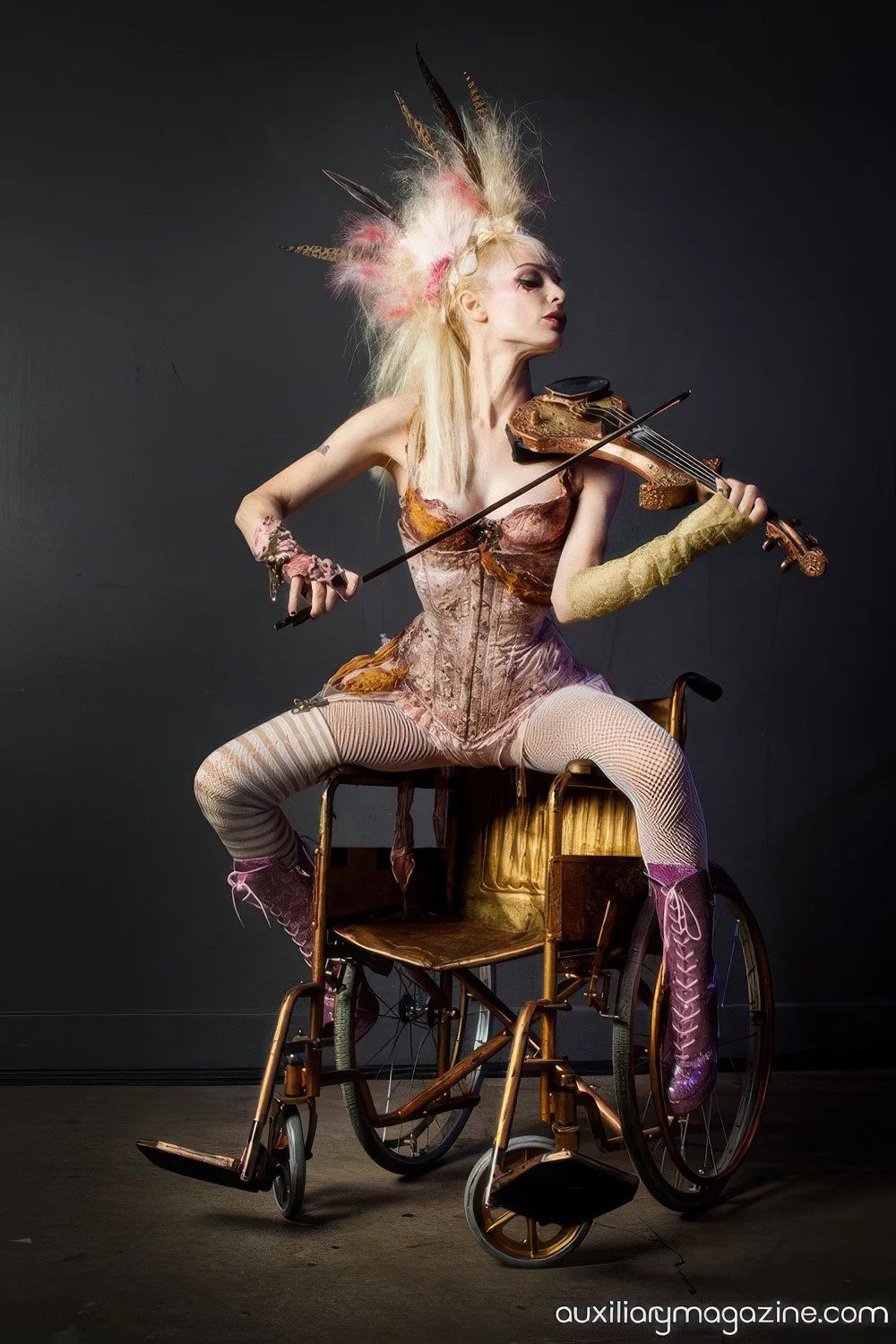 Emilie Autumn playing the violin in a photoshoot.