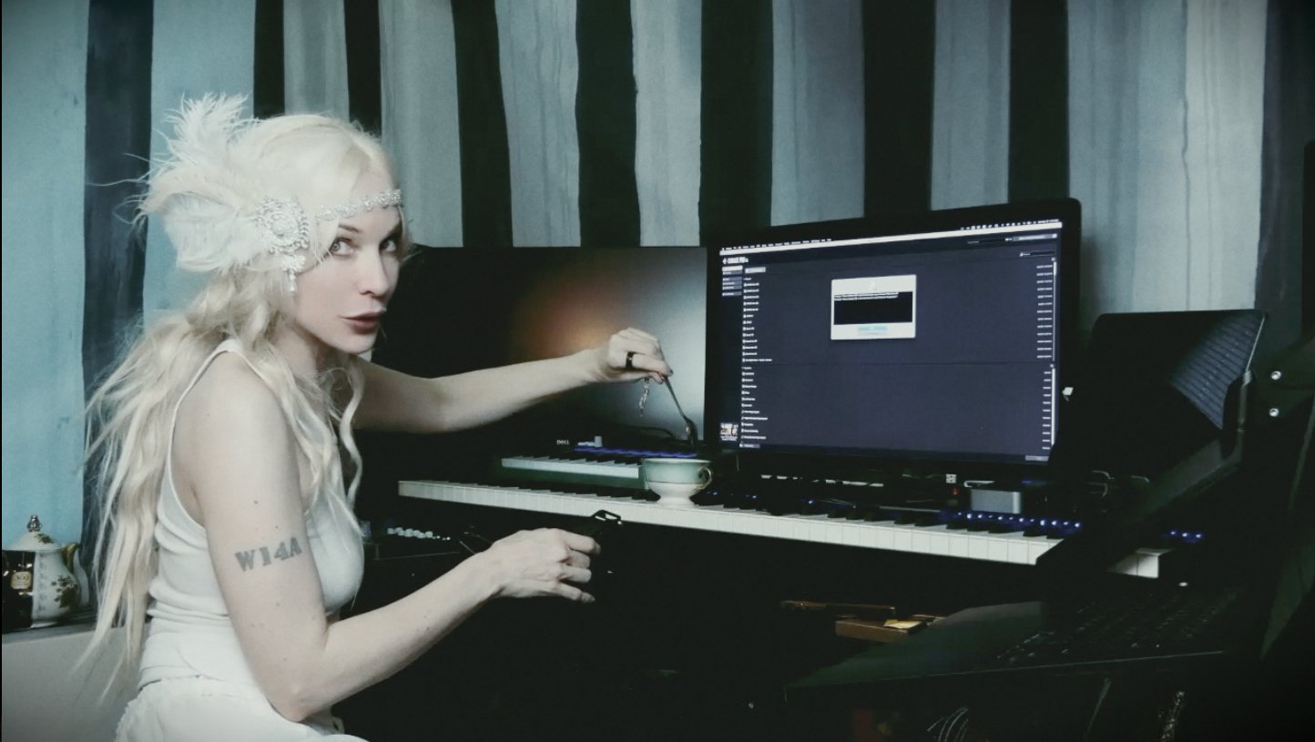 EA in the recording studio tapping on a teacup with a spoon.