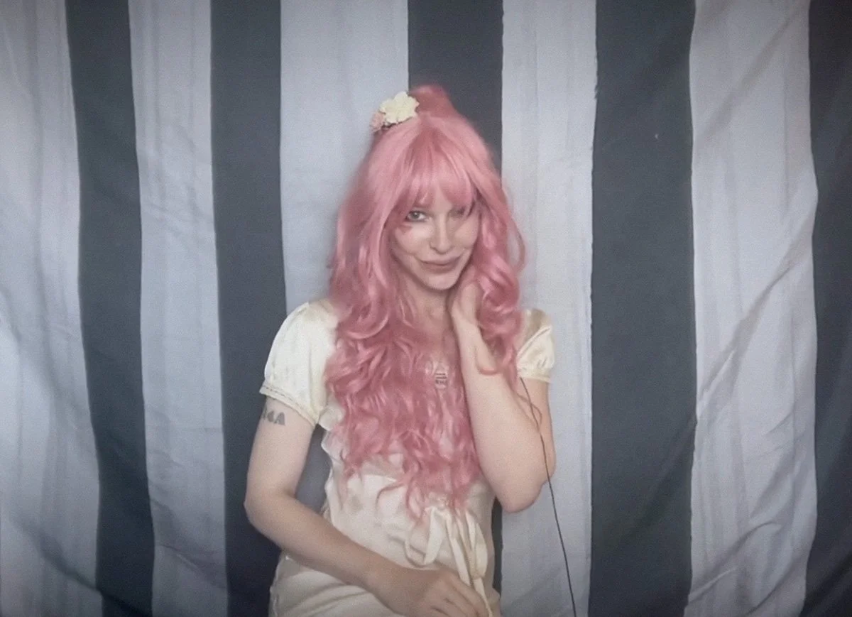 A video still of Emilie Autumn during the Welcome Ceremony