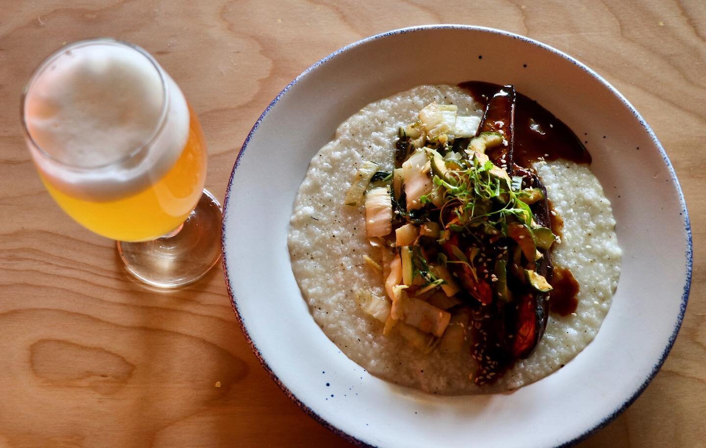 Who doesn&rsquo;t love a good happy hour! Every Wednesday &amp; Thursday at 5p- 7p $4 Market Garden Beers &amp; $5 house wine! 🥂🍻✨
.
.
Char Siu Eggplant- rice congee, cucumber chili salad, hoisin vinaigrette, braised cabbage, bok choy (V). 
.
.
Mak