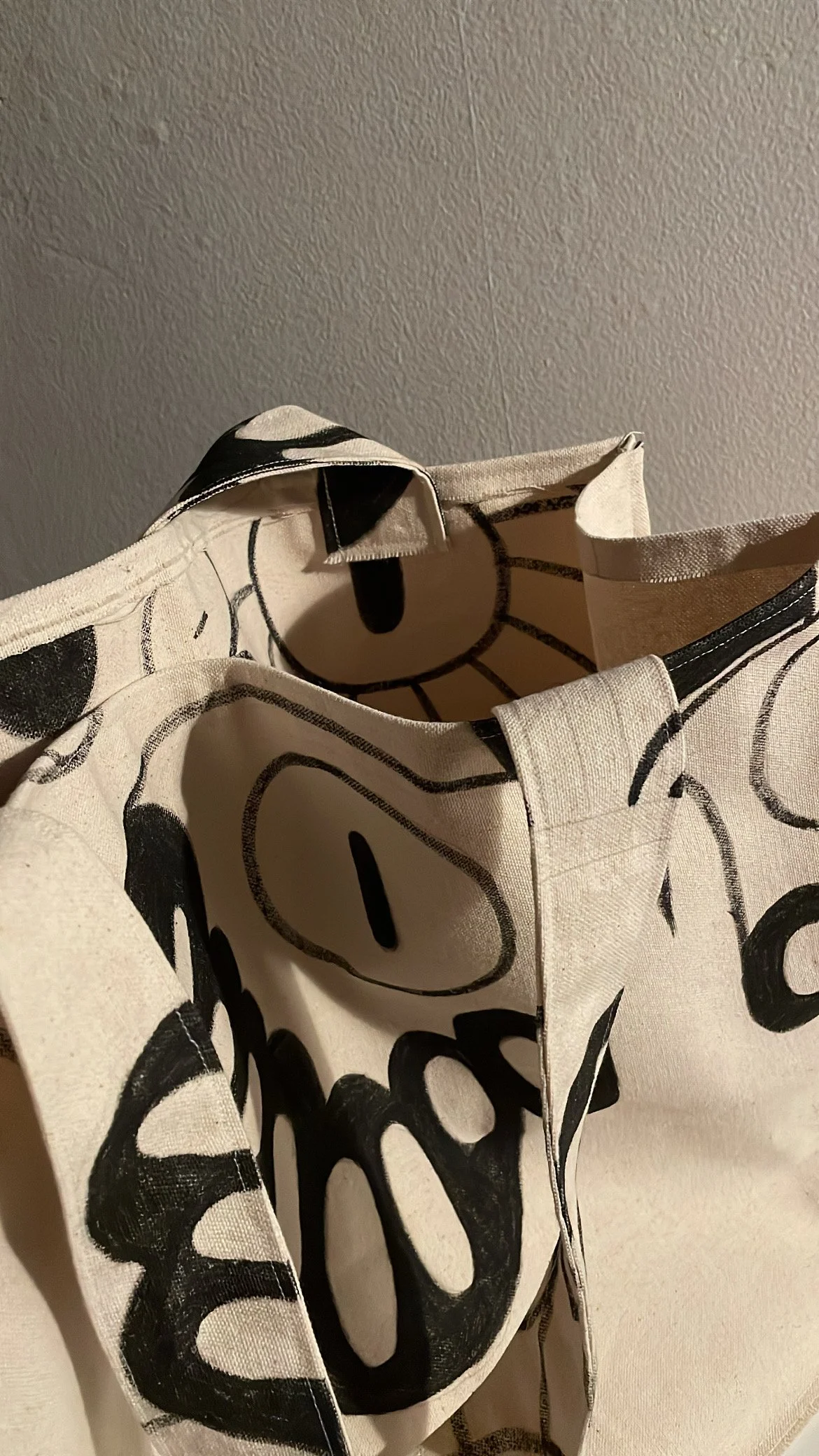 Recycled painting from 2024 hand sewn to be a custom bag. Canvas, plywood, tapestry twine 