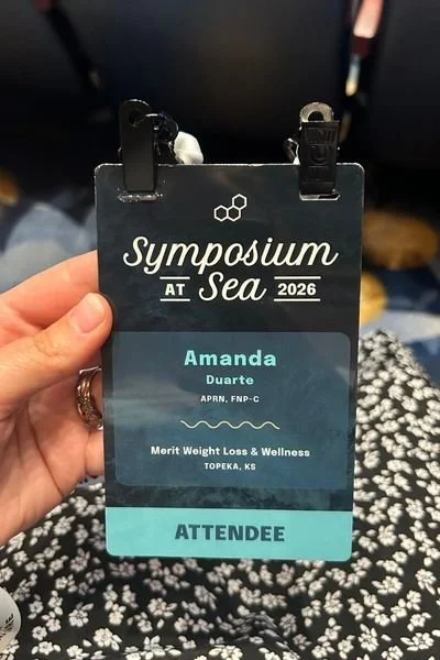 Amanda APRN Merit Weight Loss and Wellness credentials badge at the 2026 Bioidentical Hormone Revolution Symposium at Sea